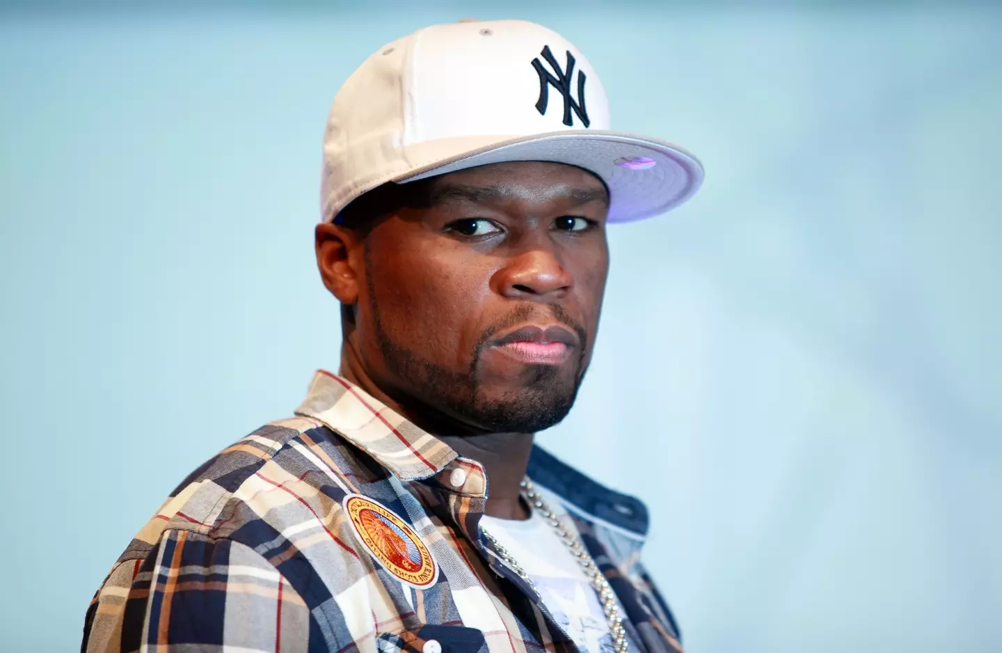 50 Cent alleges a Miami doctor used photos of him to wrongly imply he’d had penile enhancement surgery and is suing the surgeon.