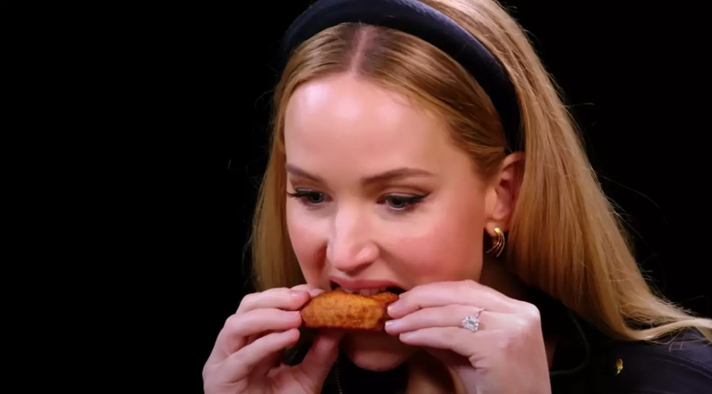 Lawrence tackling the hot sauce called Da Bomb Beyond Insanity.