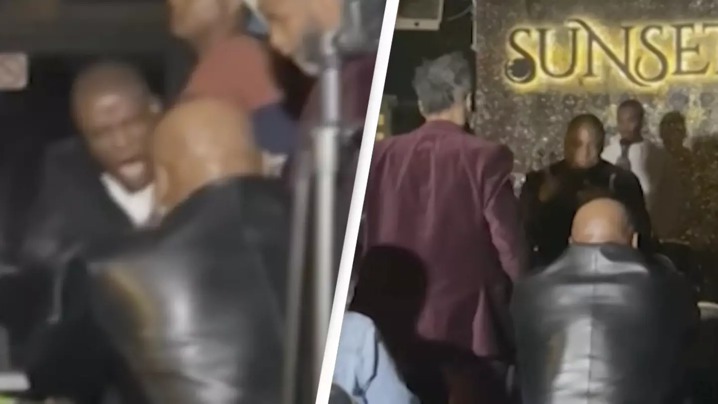 Mike Tyson Doesn't Flinch When Man Pulls Gun In Bar