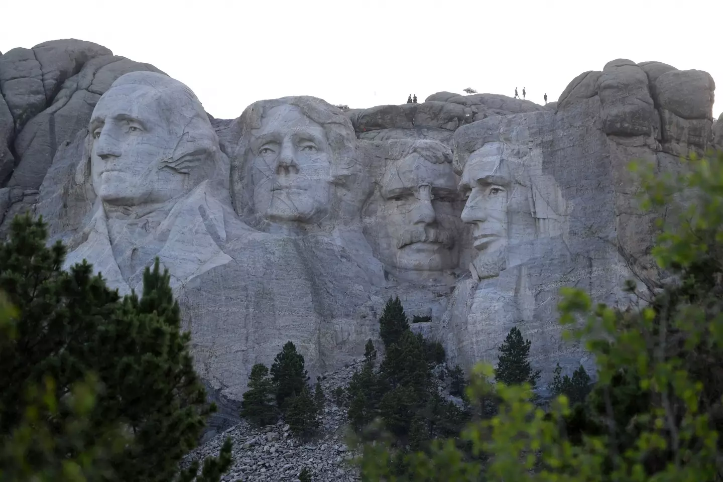 Mount Rushmore wasn't meant to look how it does now. (SAUL LOEB/AFP via Getty Images)