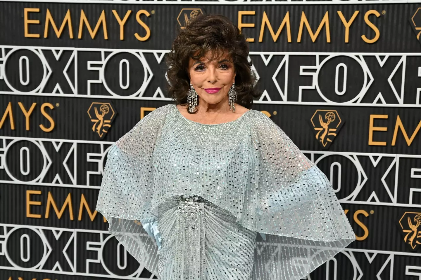 Joan Collins presented an award at the Emmys.