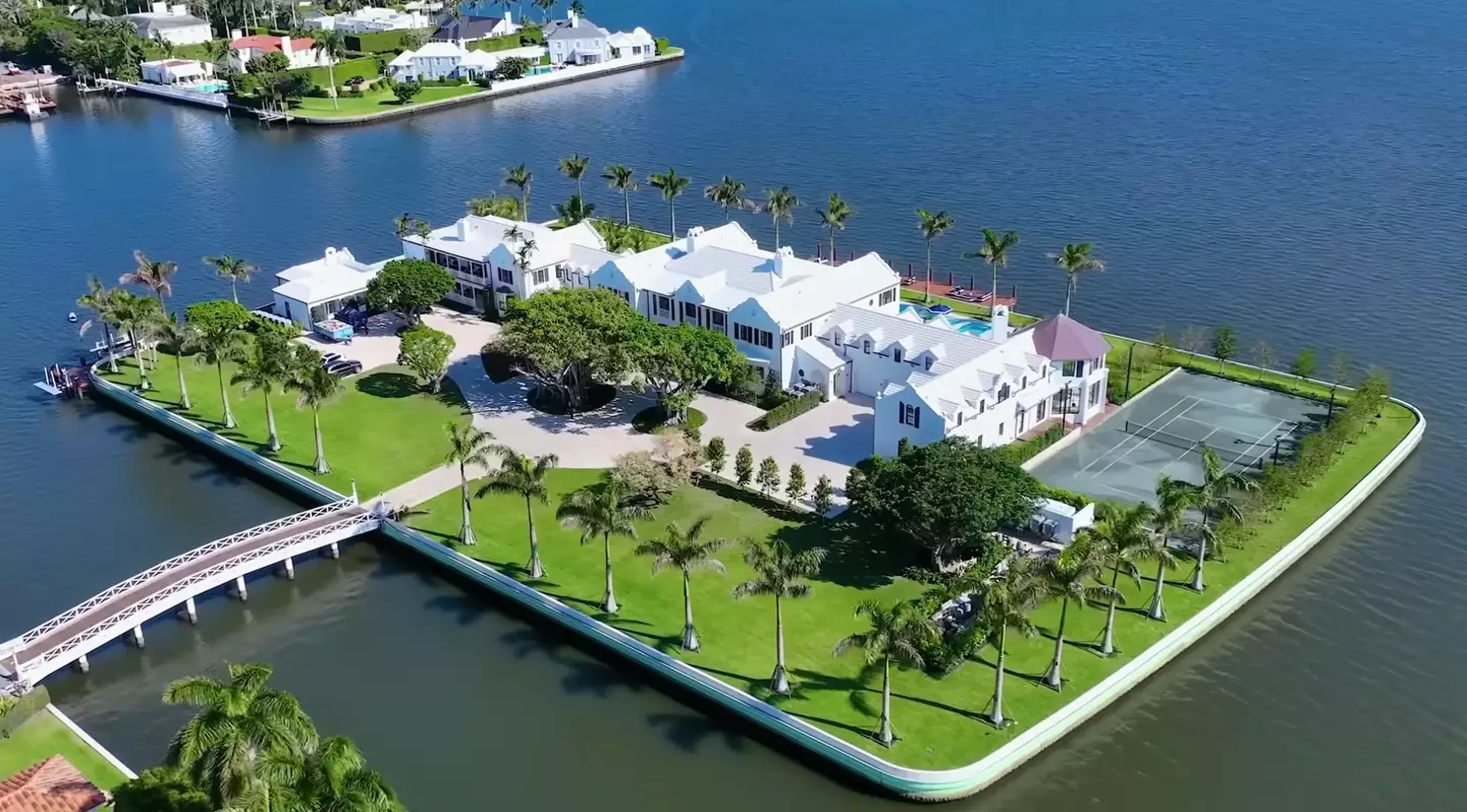 The huge home sits on its own private island.