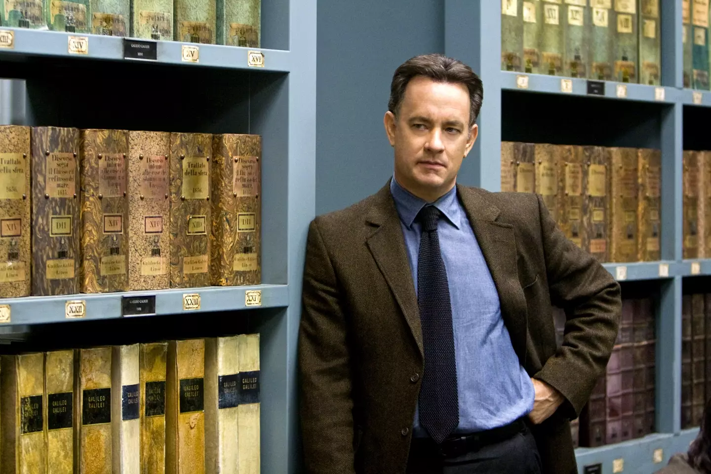 Tom Hanks with many, many books.