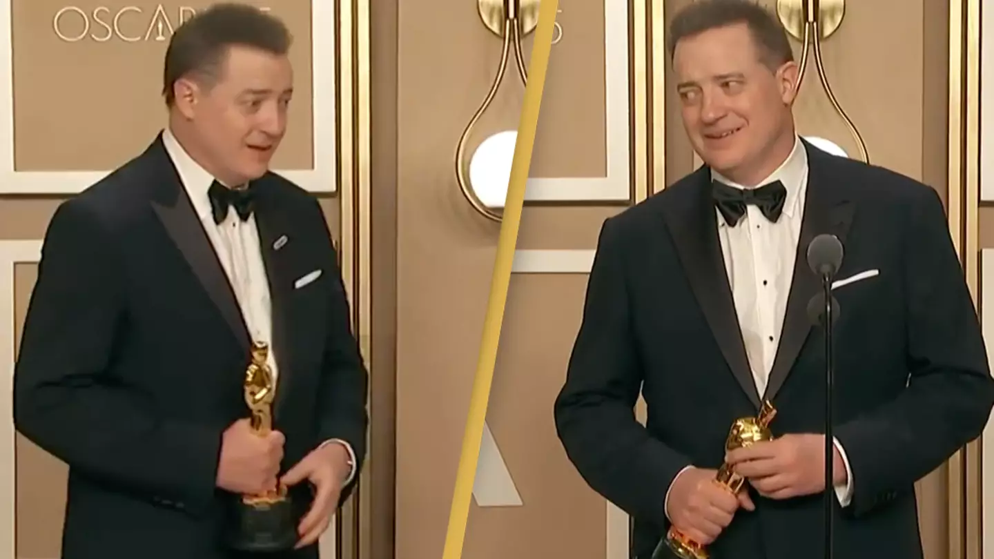 Brendan Fraser is greeted with a standing ovation as he walks into room after winning Oscar