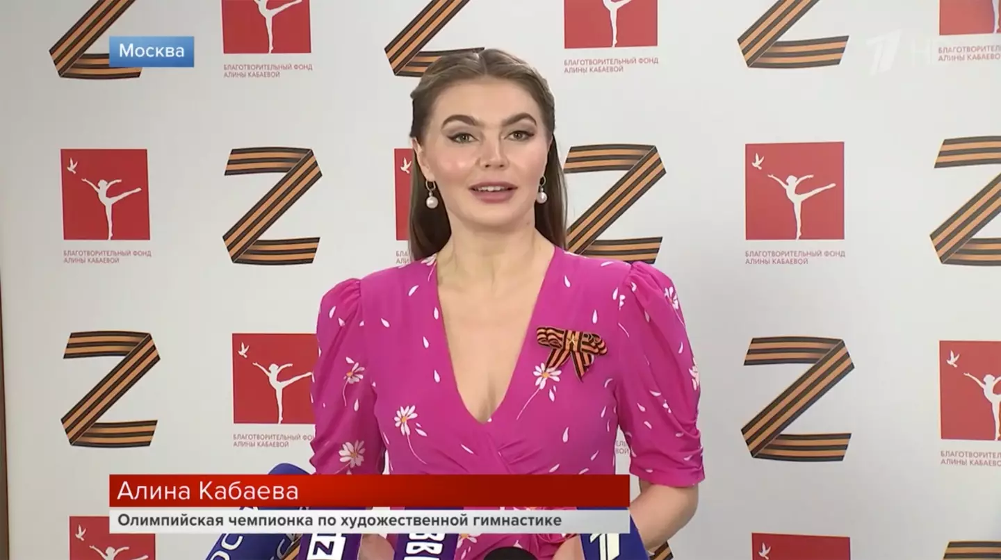 The ‘Z’ symbol featured on media billboards Kabaeva stood in front of.