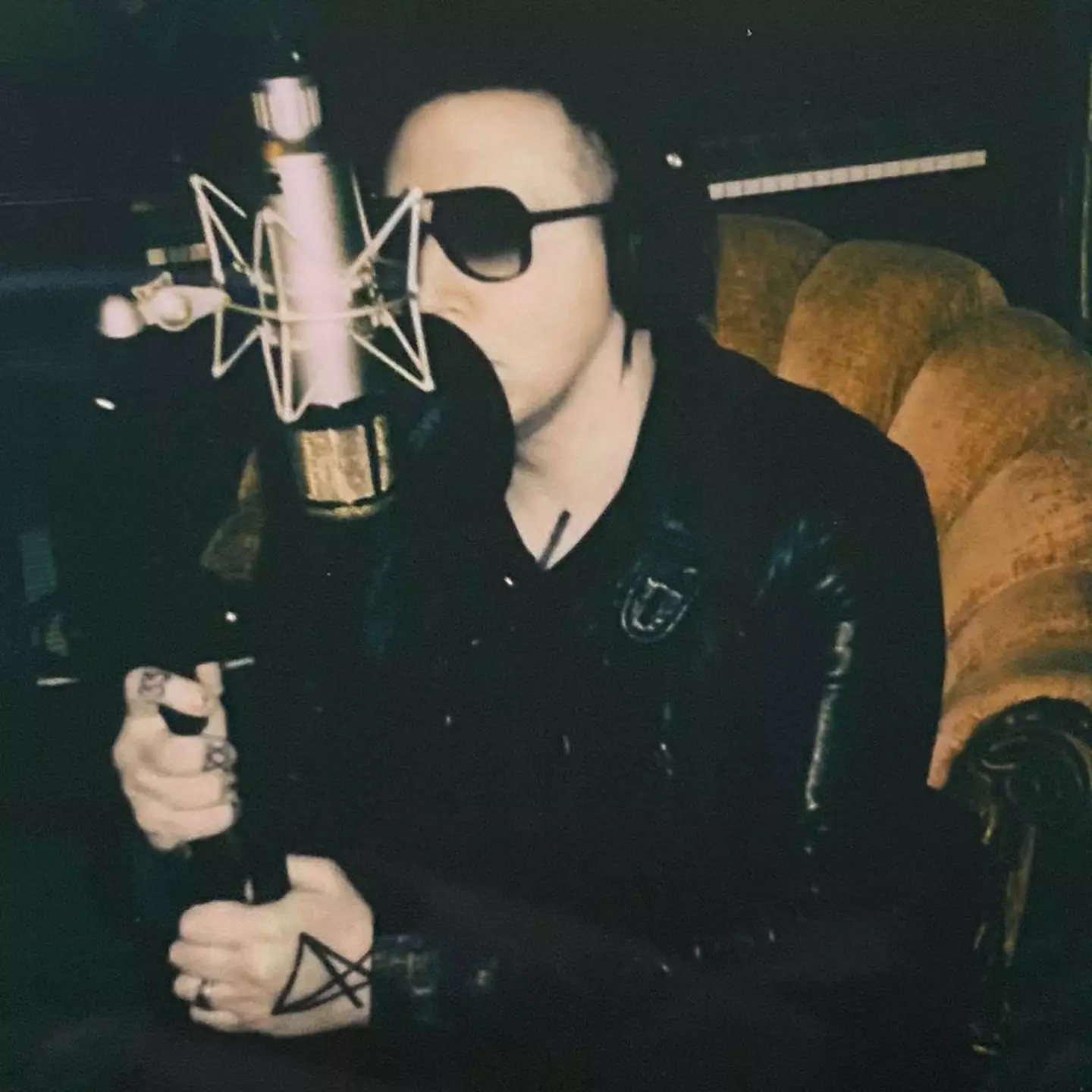 The tattoo artist received a backlash for working with the disgraced singer.