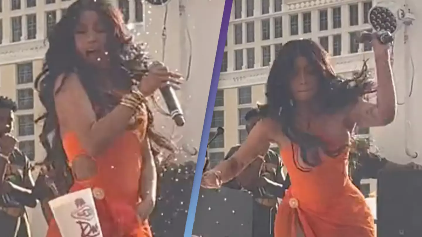 Cardi B hurls microphone at fan after they threw a drink at her