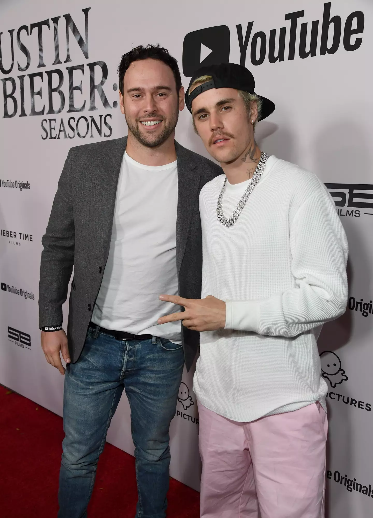 Bieber and his former manager pictured in 2020 (Kevin Mazur/Getty Images for YouTube Originals)