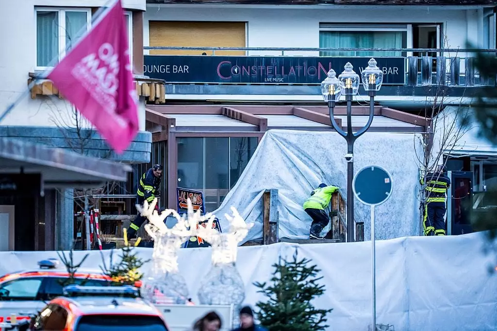 Rescuers and fire-fighters work at the site of a fire that ripped through the bar Le Constellation, in Crans-Montana, Switzerland (MAXIME SCHMID / AFP via Getty Images)