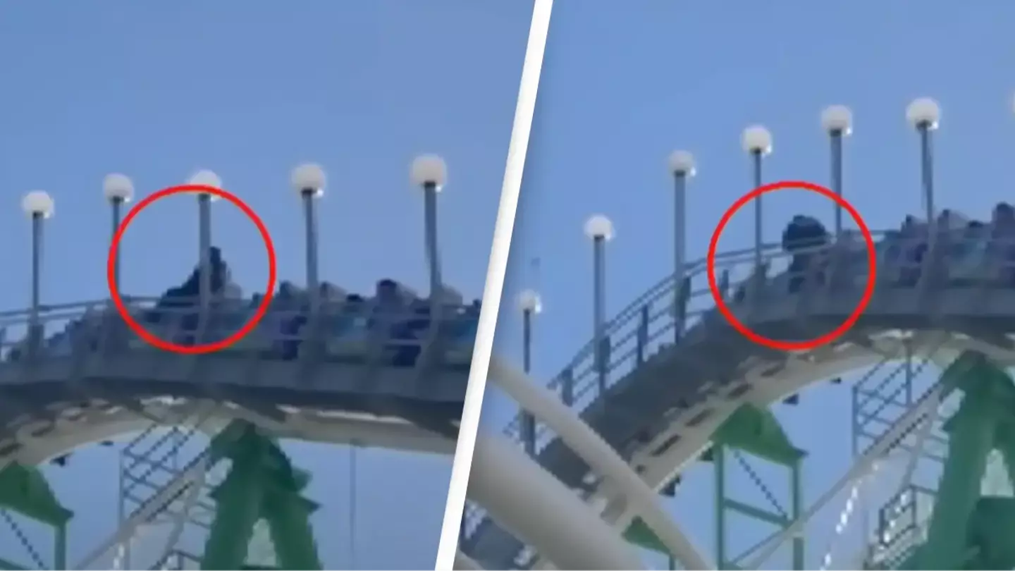 Shocking footage shows man climbing out of rollercoaster while it's at the top for terrifying reason