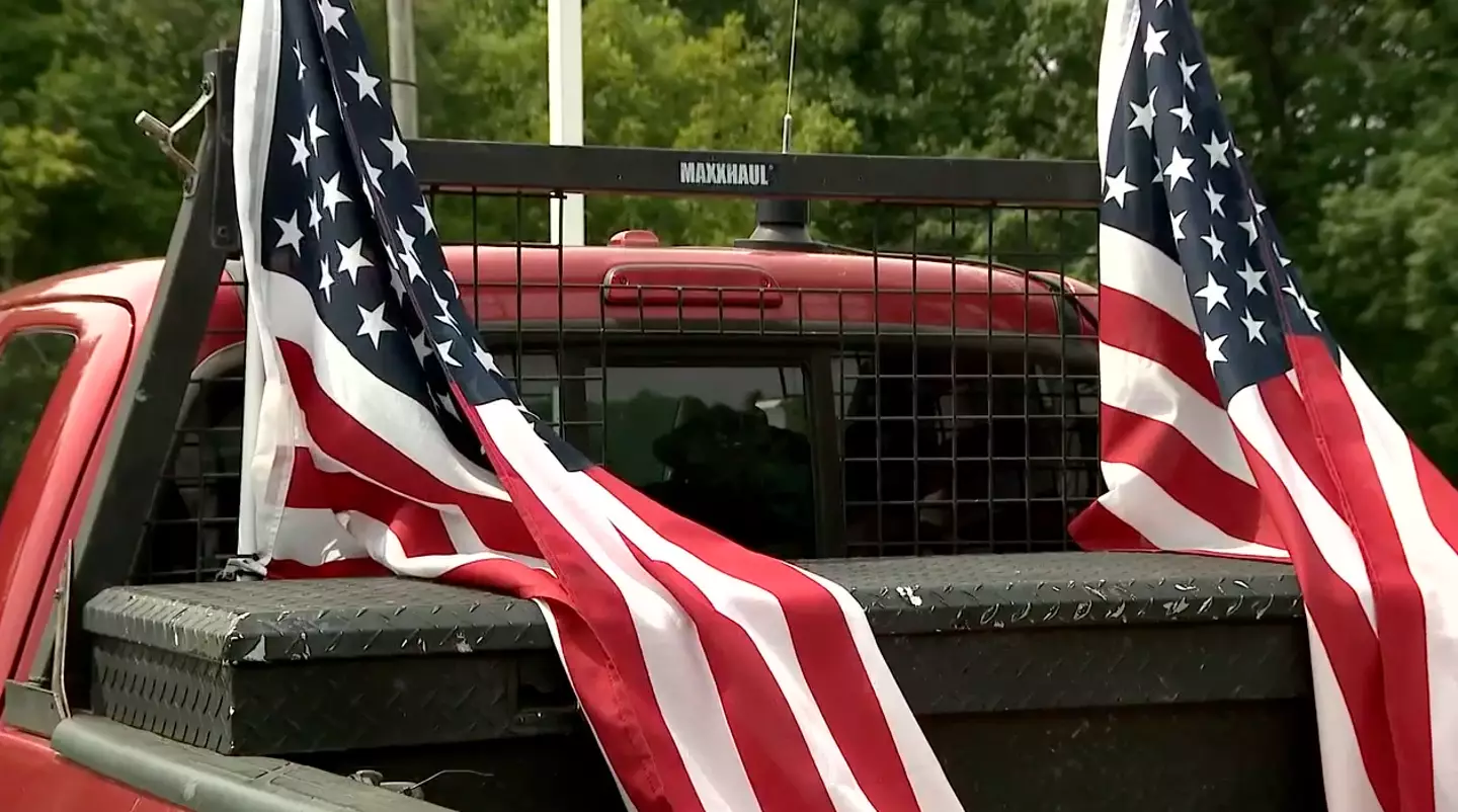 Hartless' stepmother has stood by his decision to keep the flags on his truck.