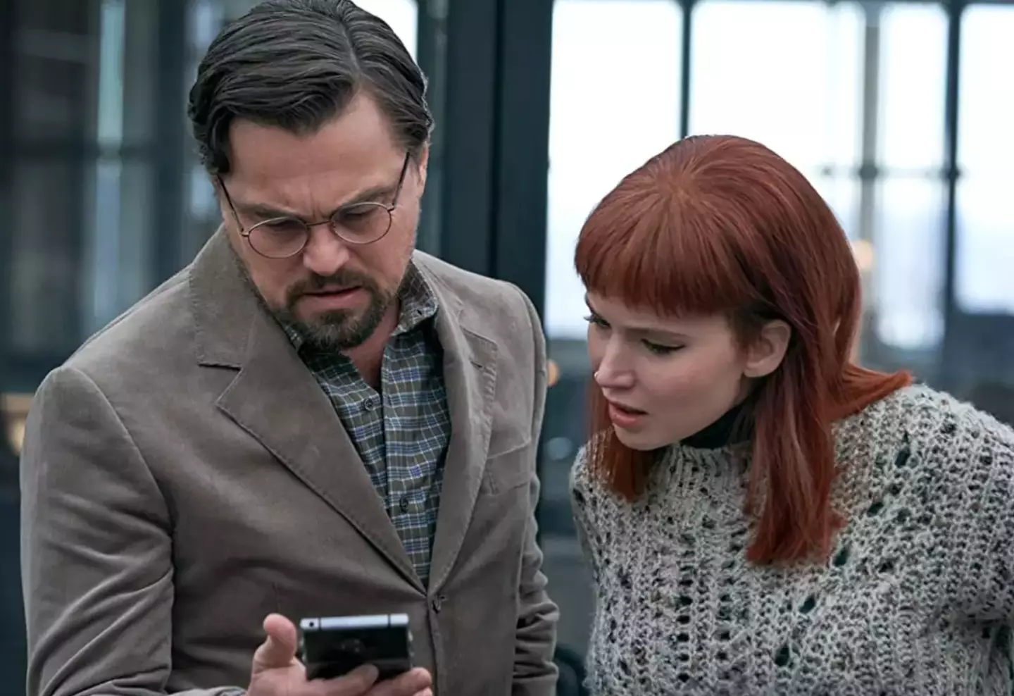 Lawrence and DiCaprio play the role of an astronomers.