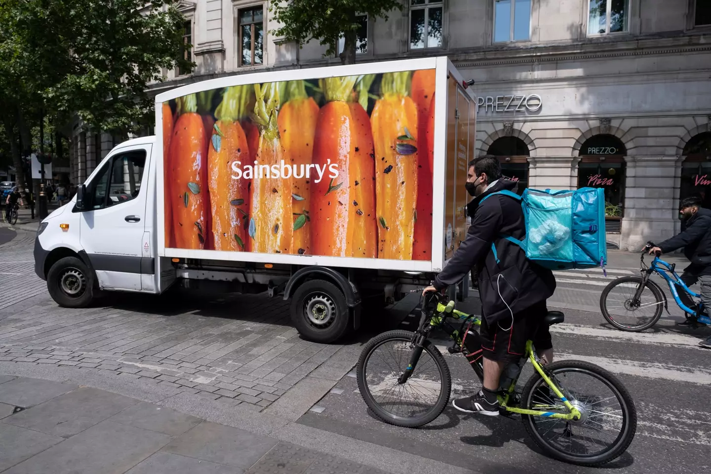 The delivery person picked up an order from Sainsbury's.