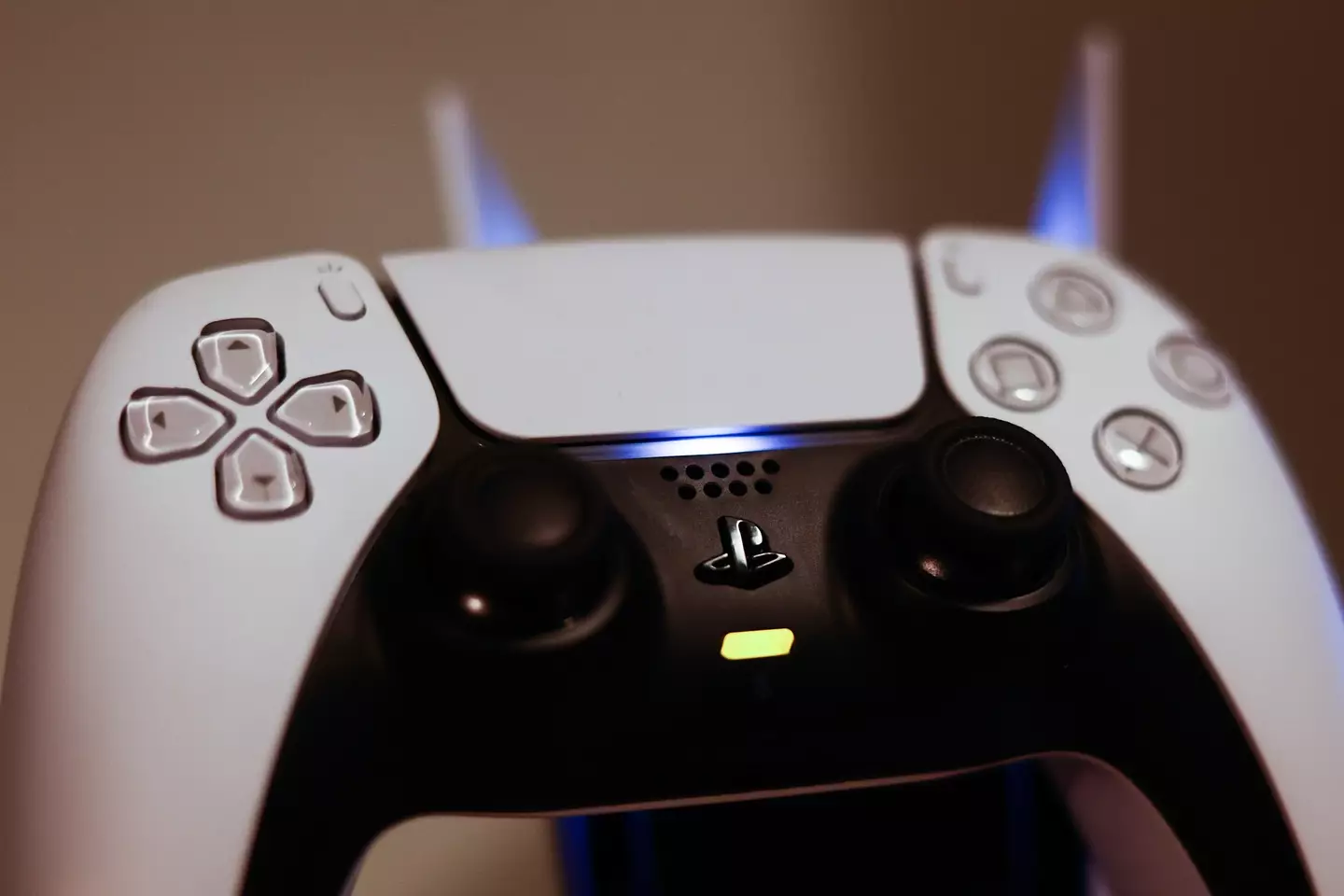 Have you ever looked closely at the underside of the PS5 controller? (Jakub Porzycki/NurPhoto via Getty Images)