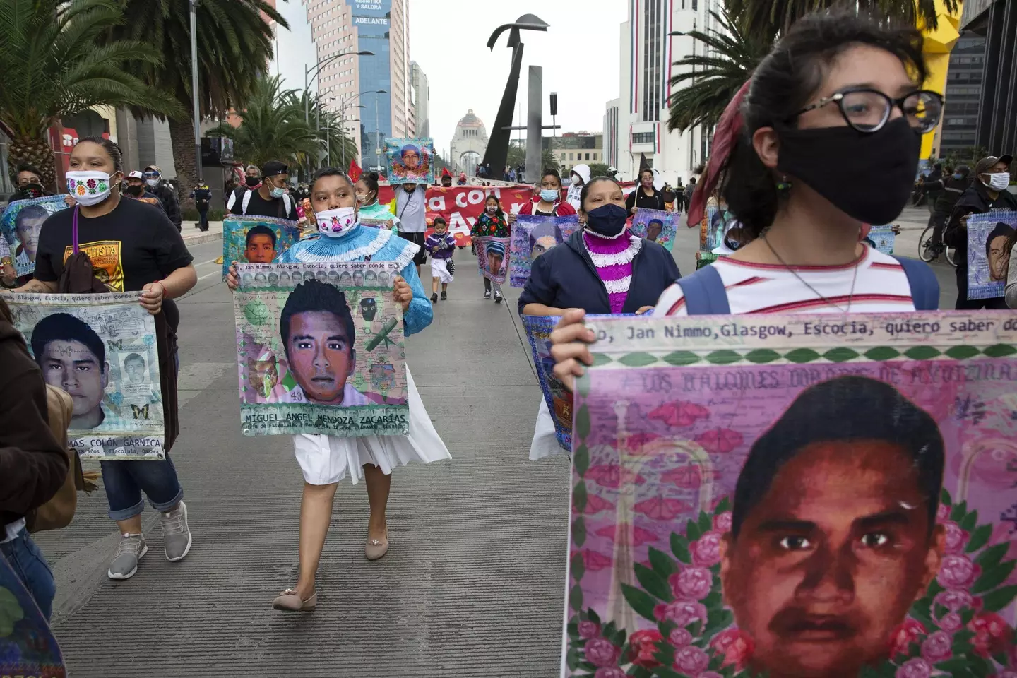 Thousands join family members of the 43 missing students in a march to mark the sixth anniversary of their disappearance.