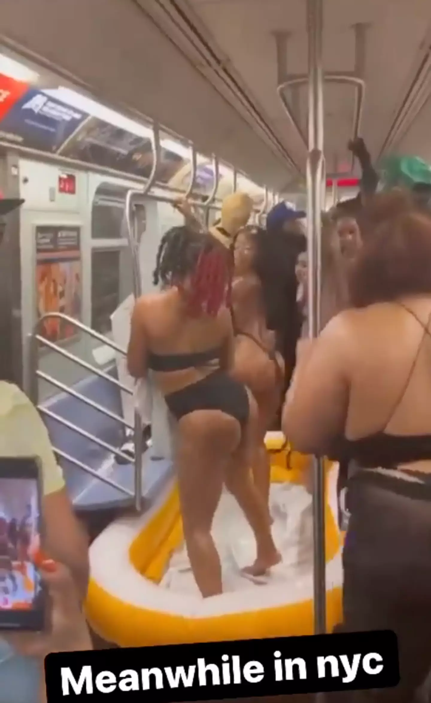 A video of a group of people throwing a pool party on the subway in New York City has gone viral.
