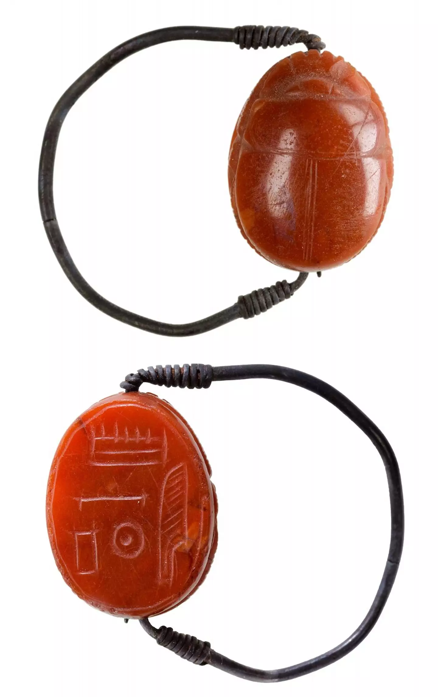 The woman was buried wearing two scarab rings in silver and gold. (Sahar Saleem/Cairo University/PA Wire)