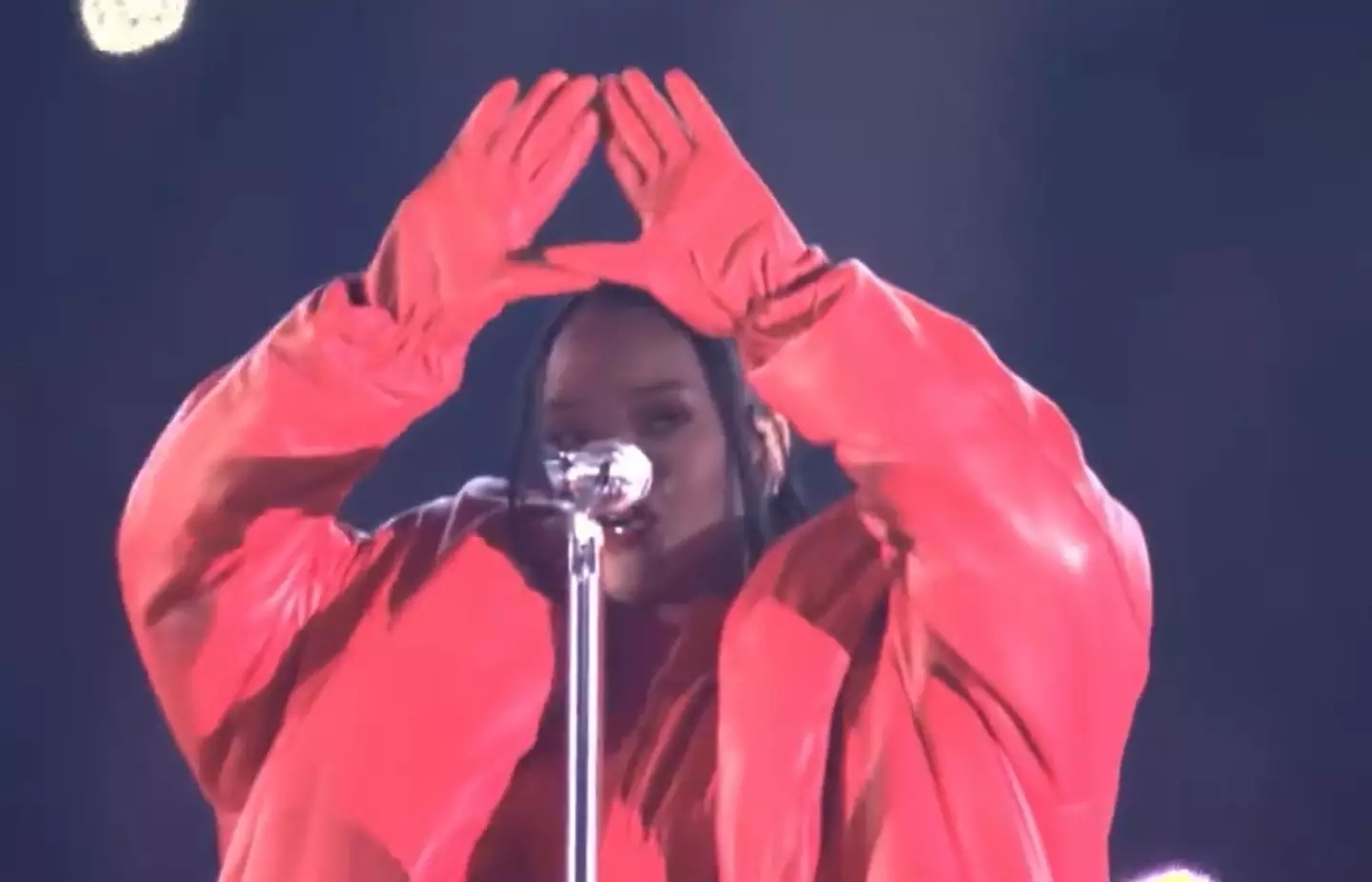 Illuminati confirmed, please ignore that she just sung the words 'diamonds in the sky' right before doing this.