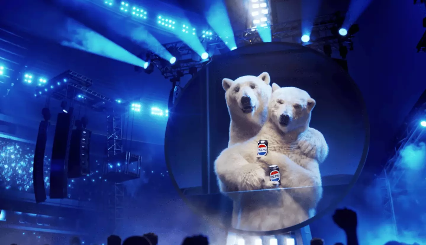 A very blatant swipe at *that* viral Coldplay kiss cam moment from last year (Pepsi)