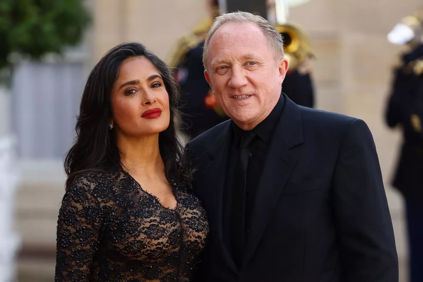 The actor with her billionaire husband (Marc Piasecki/Getty Images)