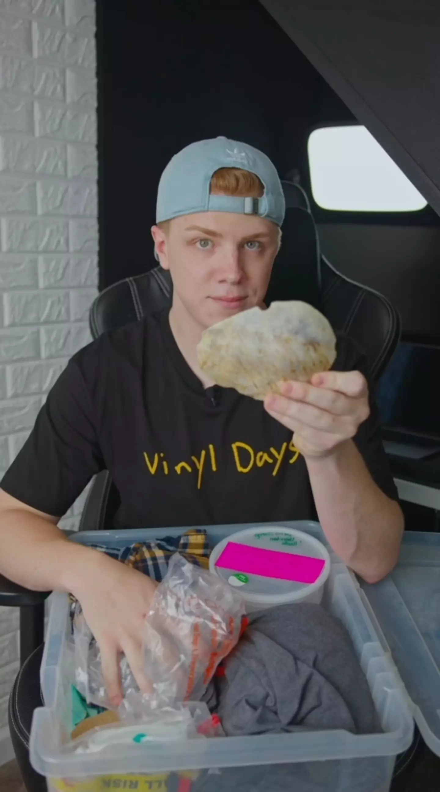 Brandon Alexander holding part of his skull.