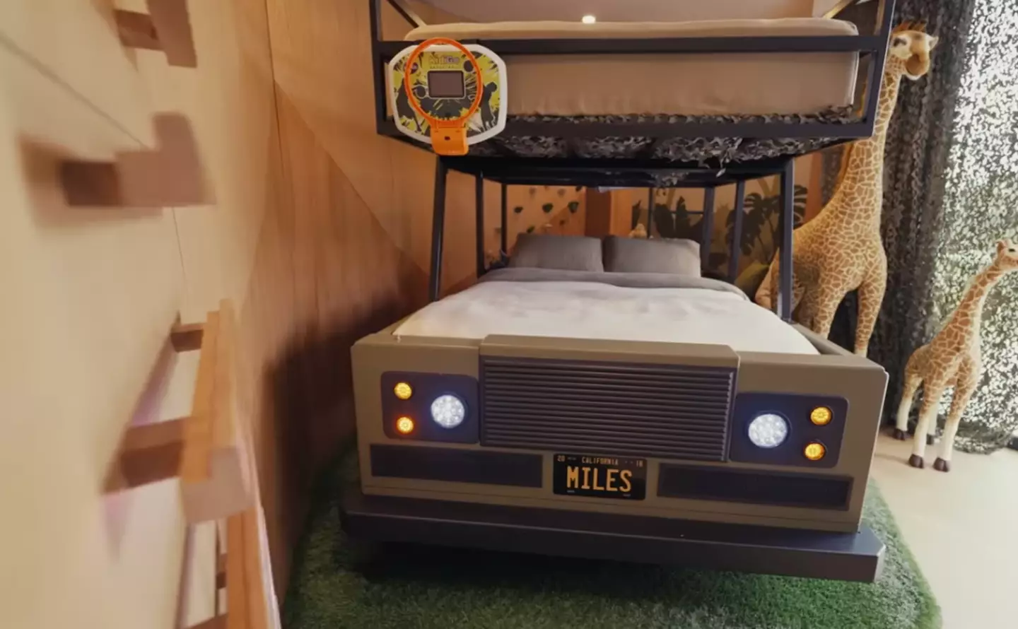 Miles has his own Jeep-designed bed with personalised plates.