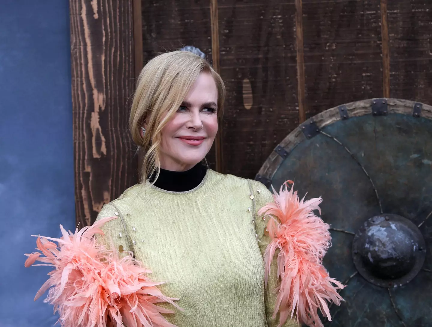 Nicole Kidman said she was 'begging' to wear the outfit featured on the cover.