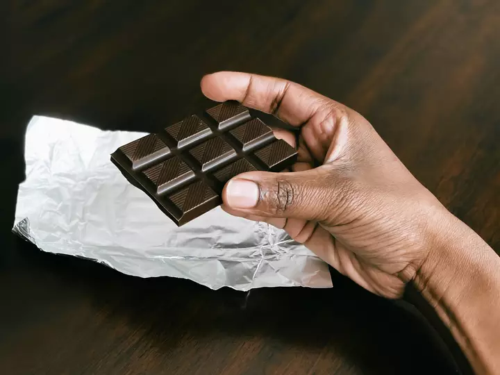 Experts have revealed the 'ideal amount' of chocolate to eat per week to offer health benefits (Getty Stock Images)