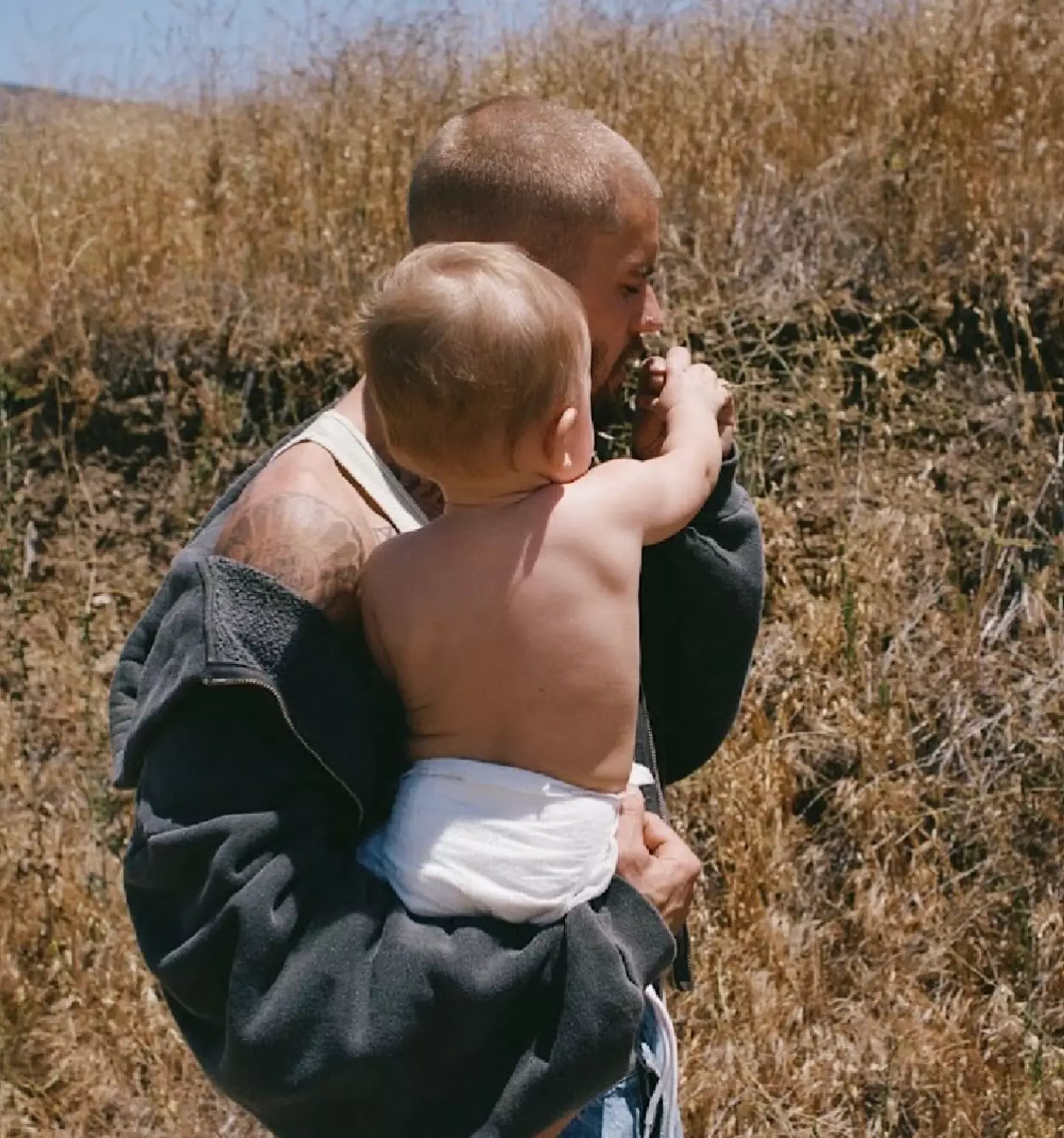 Bieber shared a heartfelt picture with fans of him holding baby Jack (Instagram/@lilbieber)