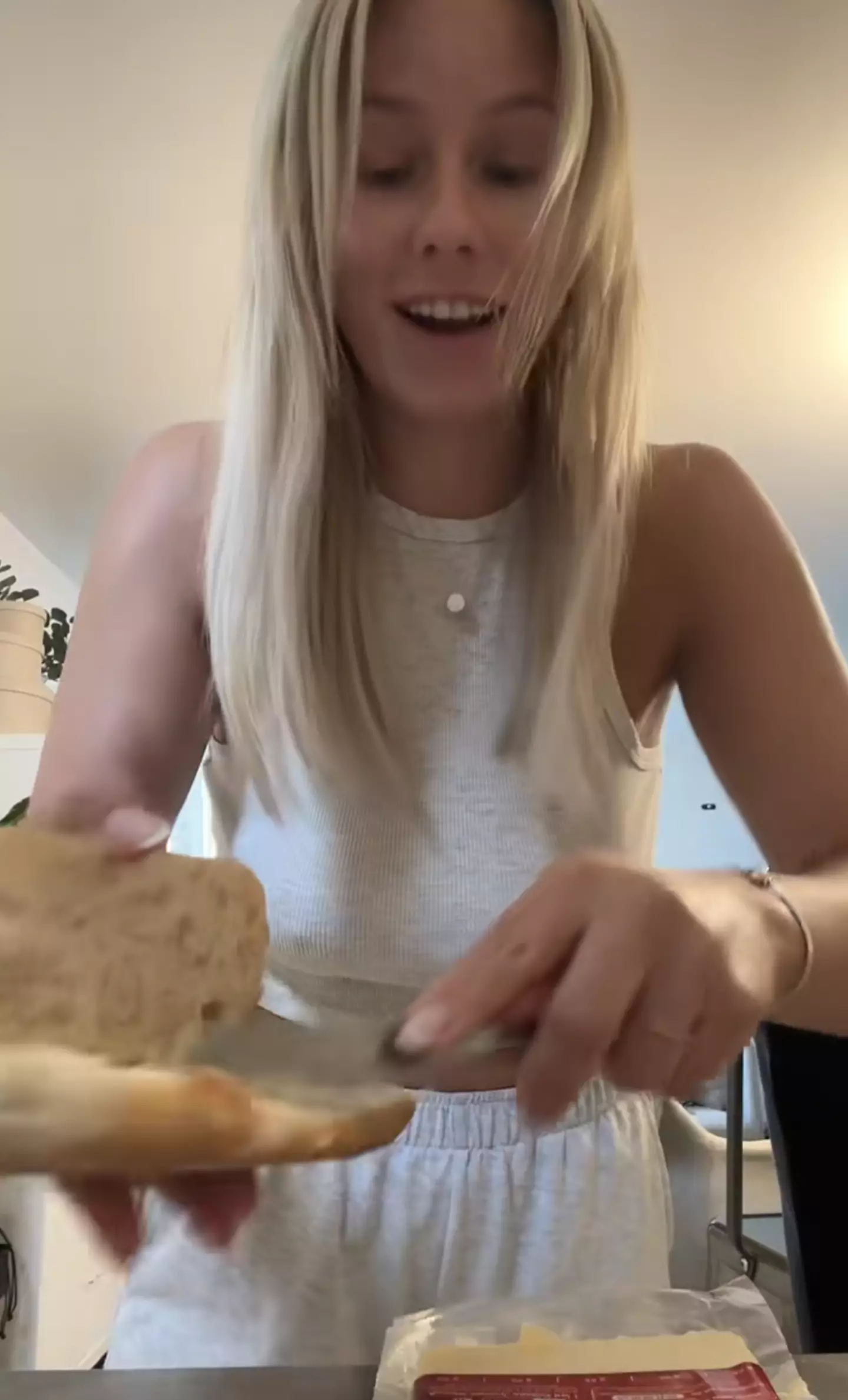 The American didn't know that it's actually a popular way to eat a sandwich.