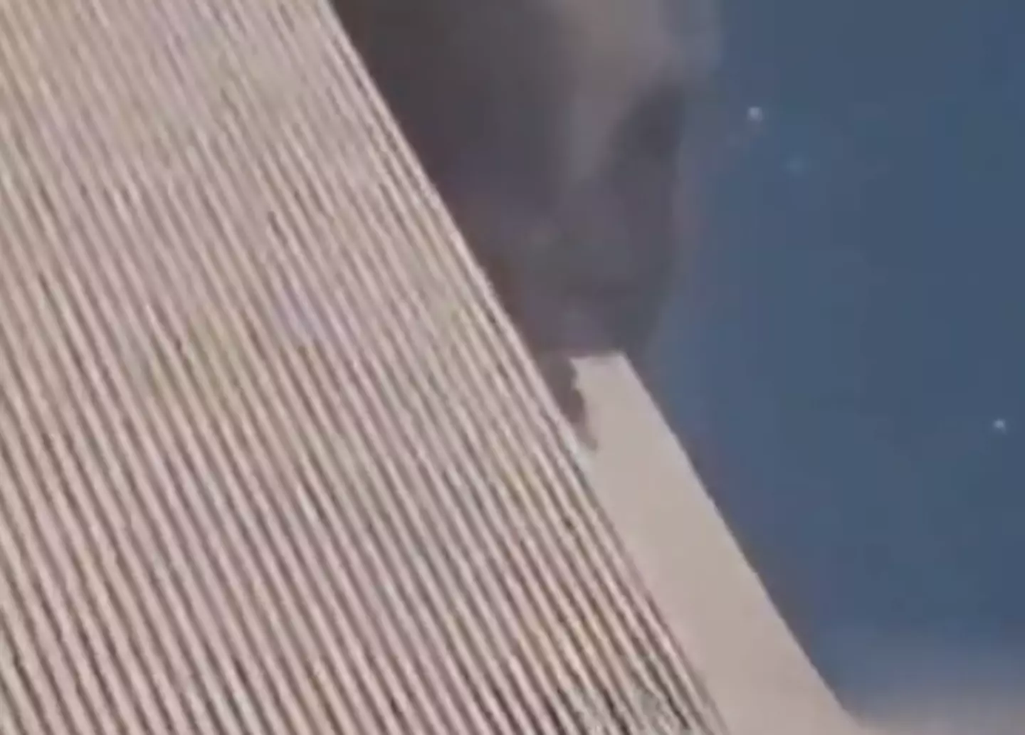 The North Tower was totally engulfed in smoke and flames.