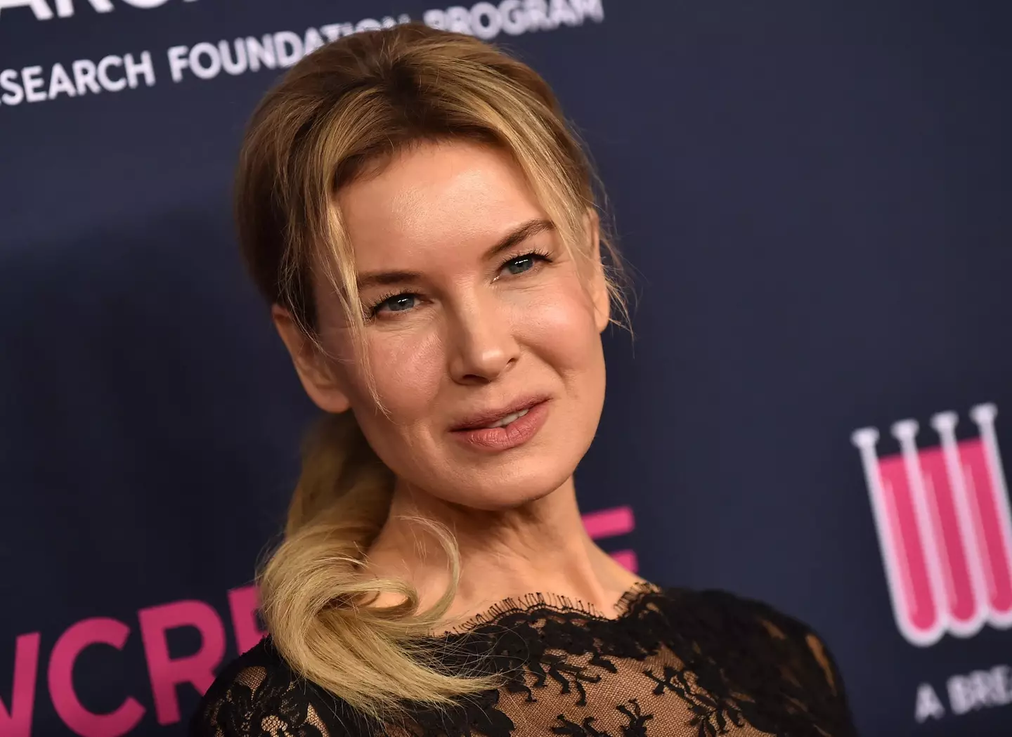 Renee Zellweger has opened up about what a producer said to get her to remove her clothes on set.
