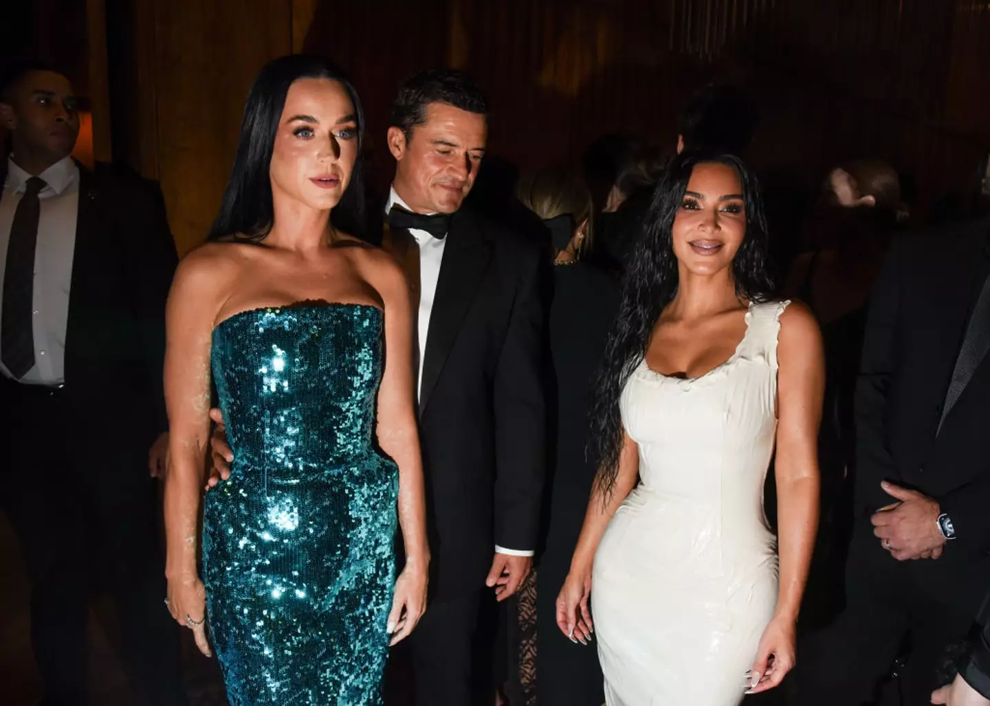 Orlando Bloom goggles Kim Kardashian's bum while holding fiancee Katy Perry (Steve Eichner/WWD via Getty Images)