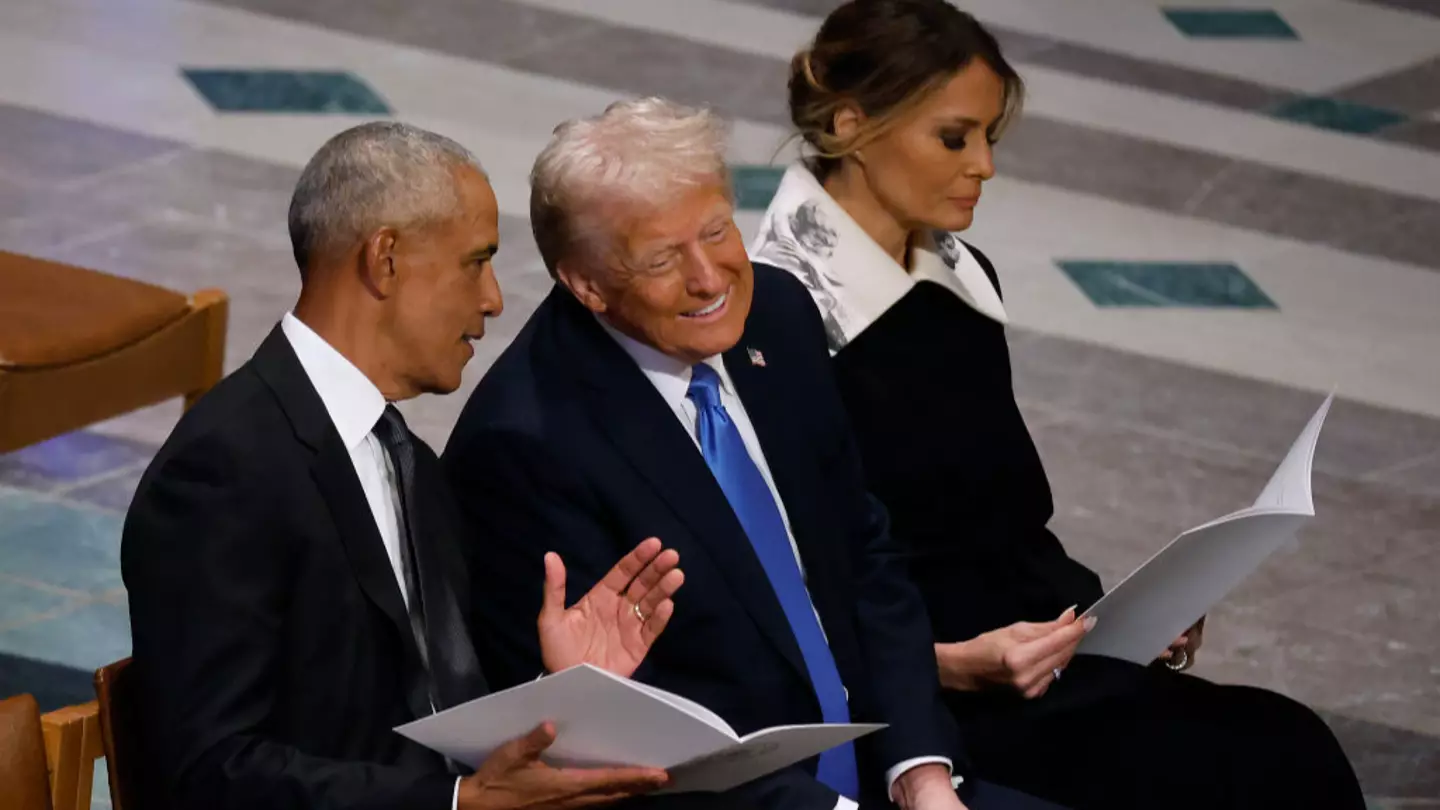 What Trump really said to Obama as they were spotted laughing at Jimmy Carter's funeral finally revealed