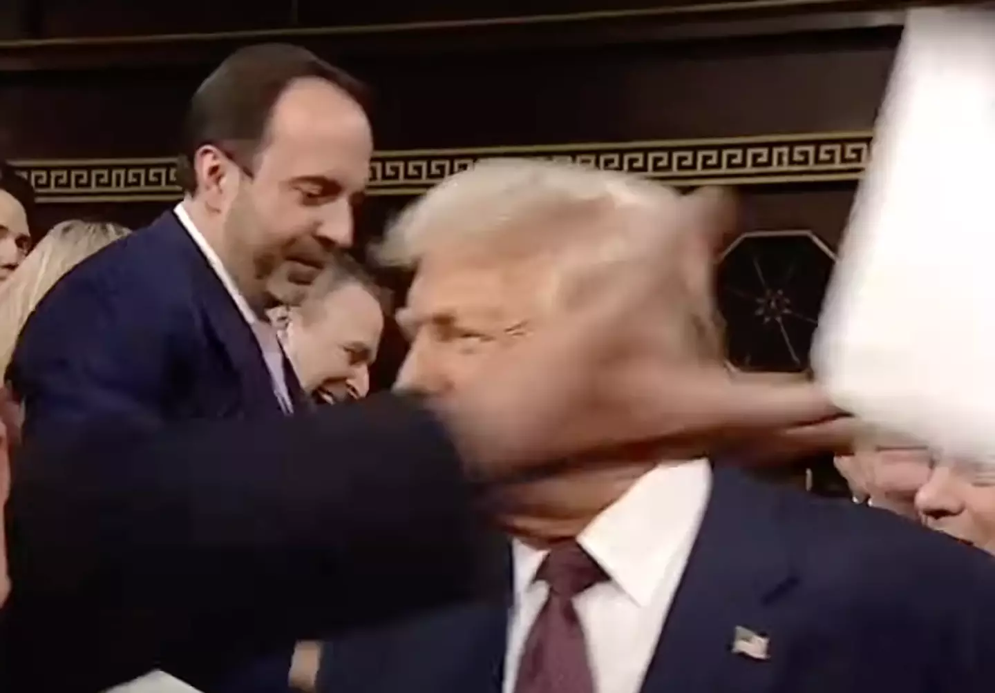 Stansbury shared images of her sign online after it was ripped from her hands (CNBC Television)