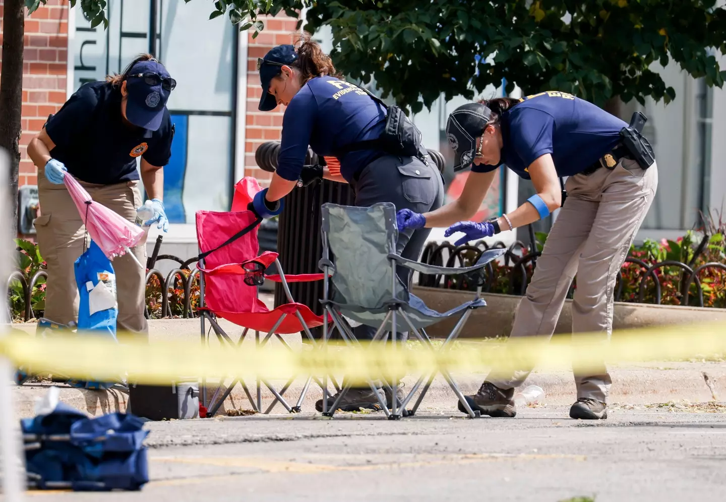 Police at the scene of the Highland Park massacre.