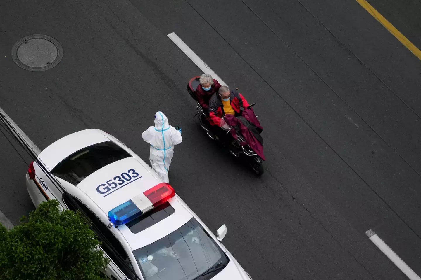 A police car seen outside a residential compound during a lockdown in Shanghai.