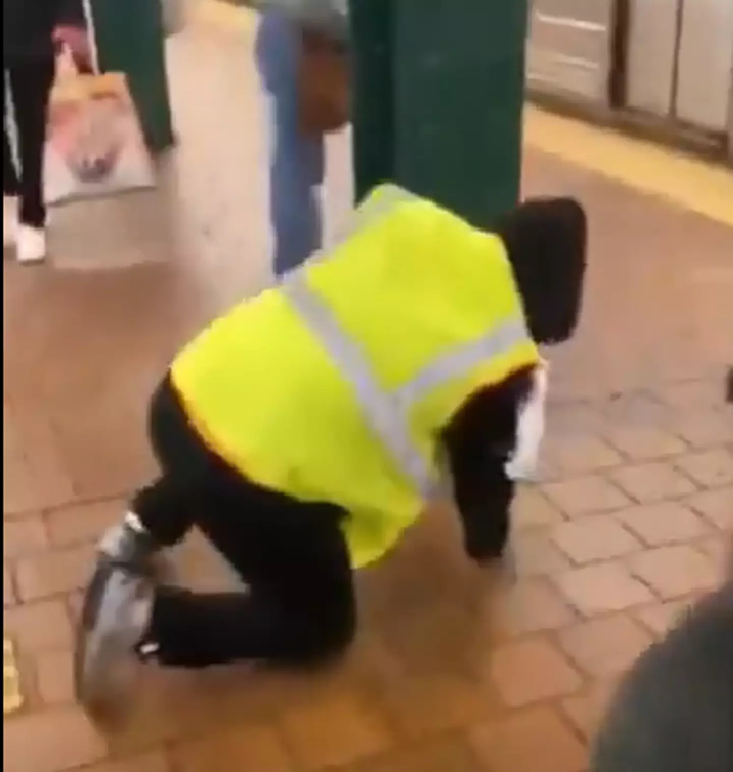 Nearby people helped the man up after the incident. (@retronyc/Instagram)