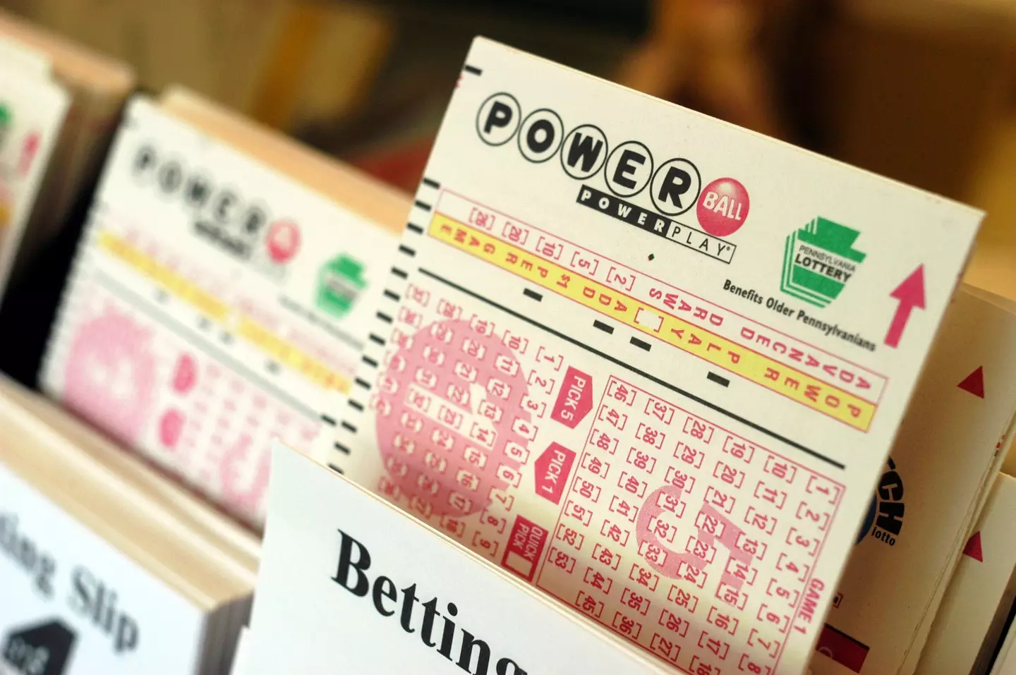 One lucky Australian woman has admitted she started slapping her face in shock after realizing she had a winning lottery ticket.
