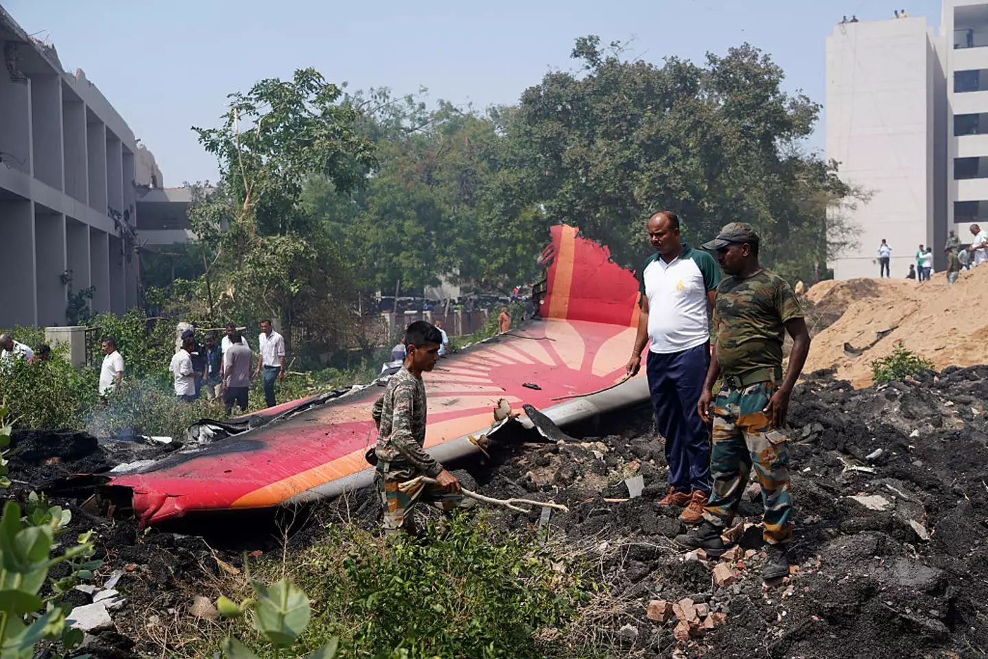 The plane's remains were badly charred after the crash (Siddharaj Solanki/Bloomberg via Getty Images)