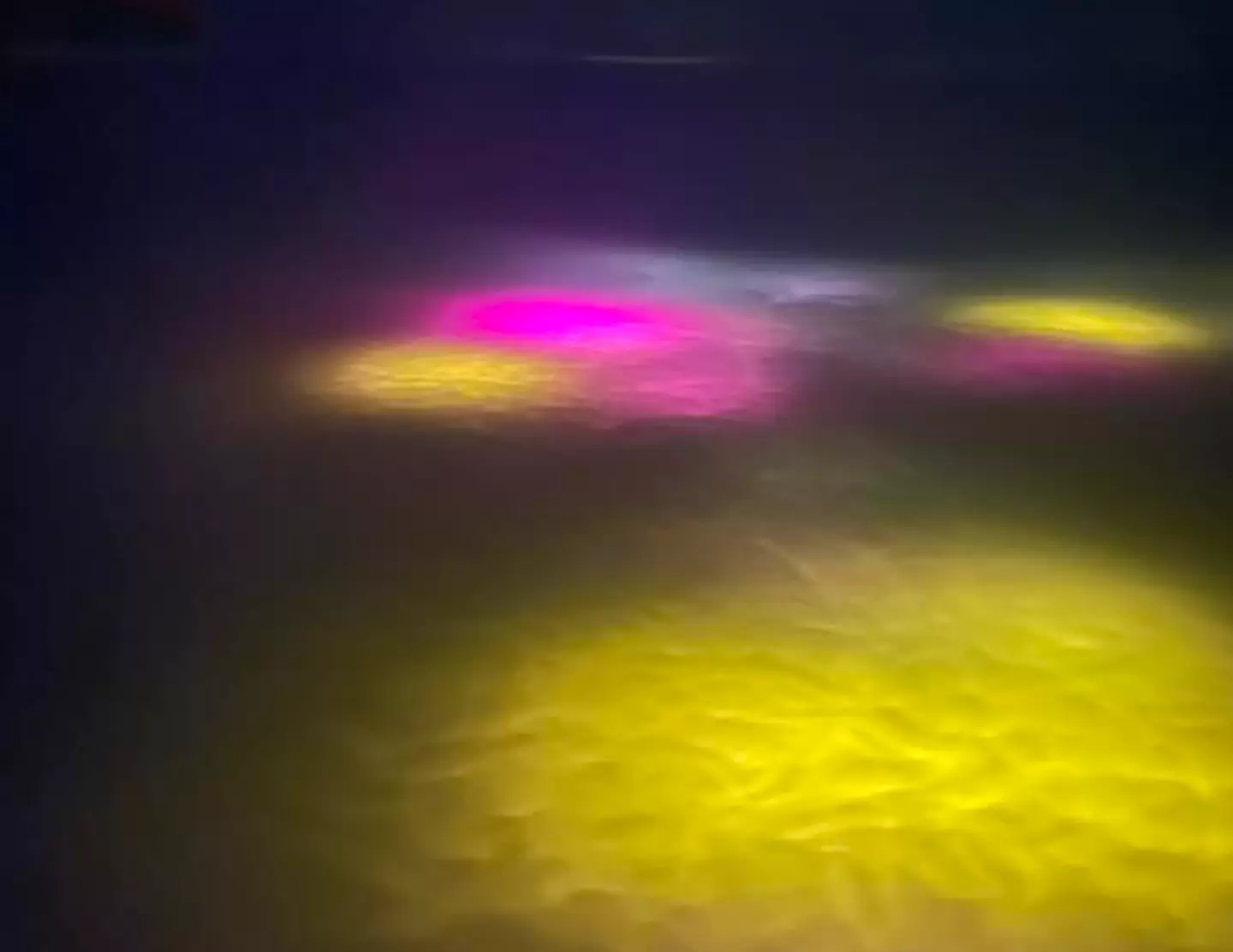 The lights were visible from the window of the plane (Facebook/Rohan Goonewardena)