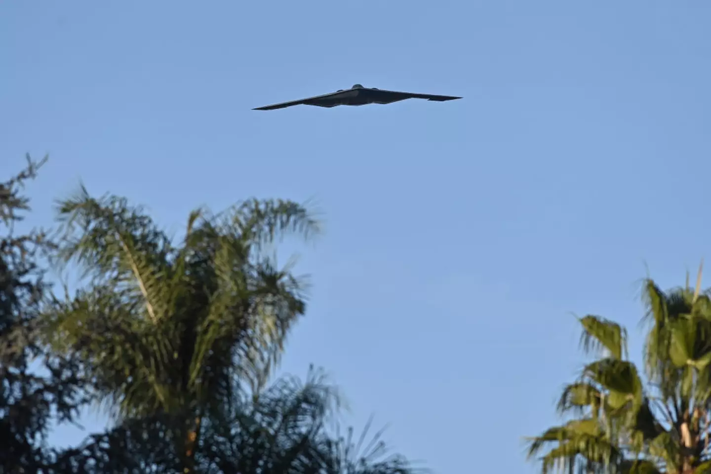 Three B-2 'Spirit' Stealth Bomber, pictured flying over Pasadena in California back in January, have been deployed to a military base near to Iran (Jerod Harris/Getty Images)