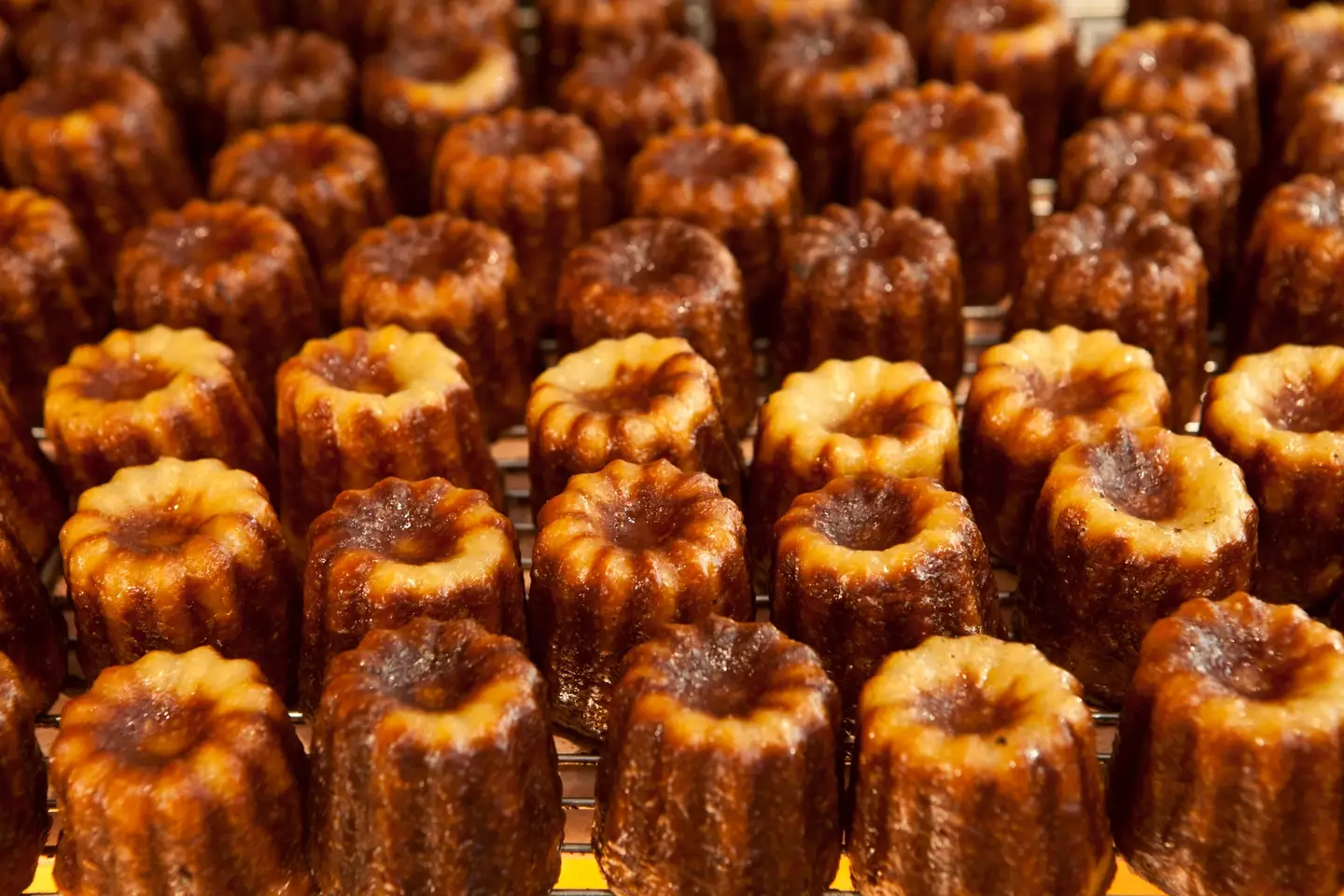 They might only be little but rum-soaked canelés can pack a serious punch (Tim Graham/Getty Images)