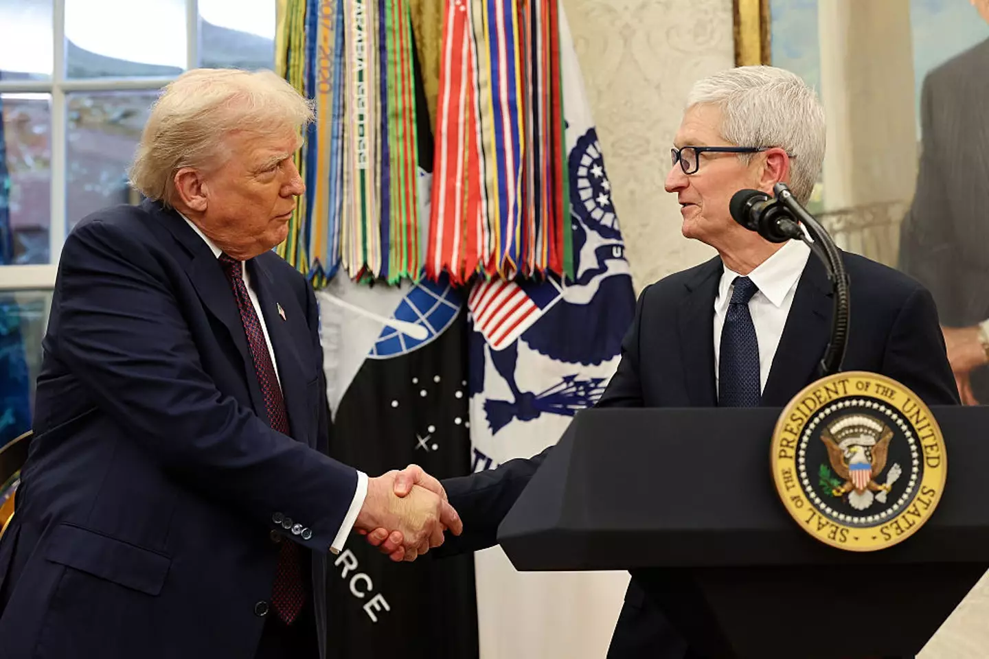 Tim Cook and Donald Trump talked about US-made iPhones (Win McNamee/Getty Images)