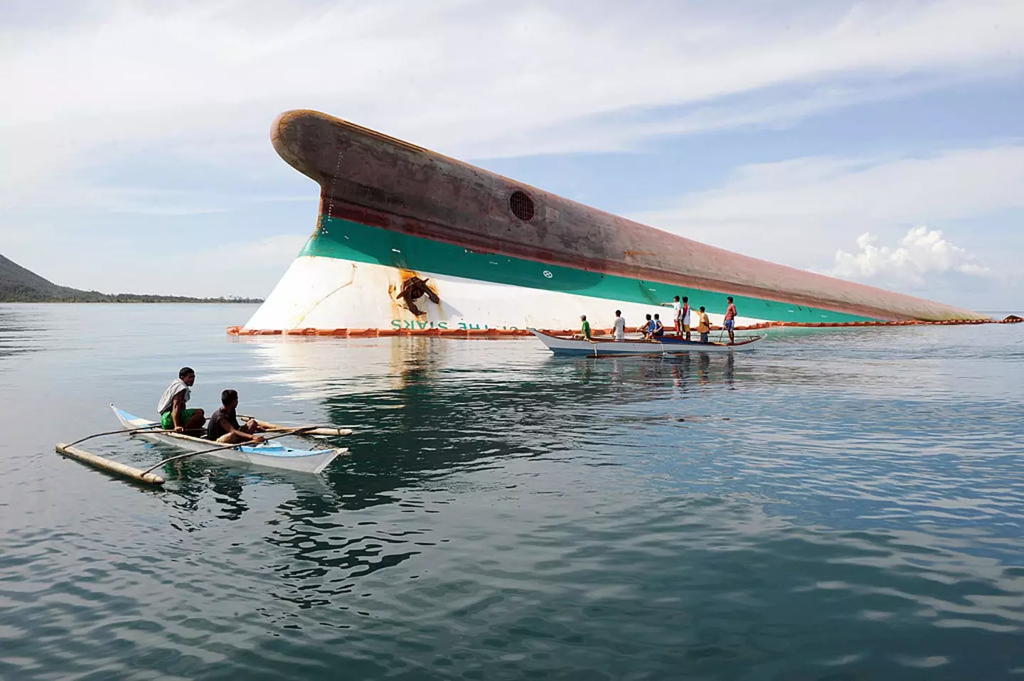 The ship capsized due to a cyclone. (ROMEO GACAD/AFP via Getty Images)