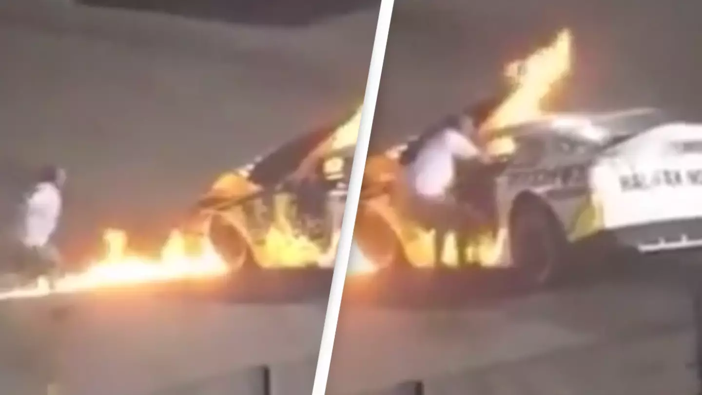 Unbelievable clip captures moment father rushed onto track to save his son from burning race car