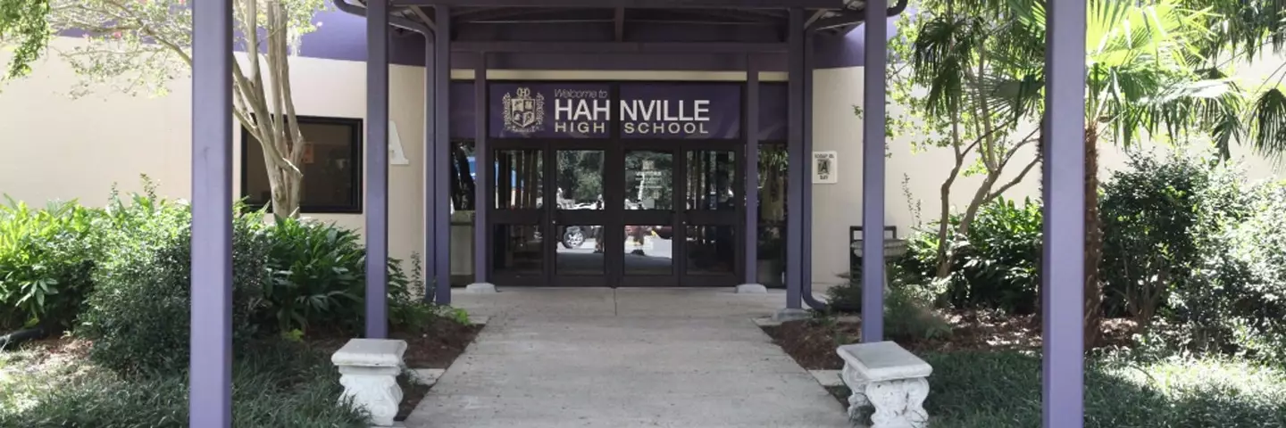 A woman is accused of fraudulently enrolling at Hahnville High School.
