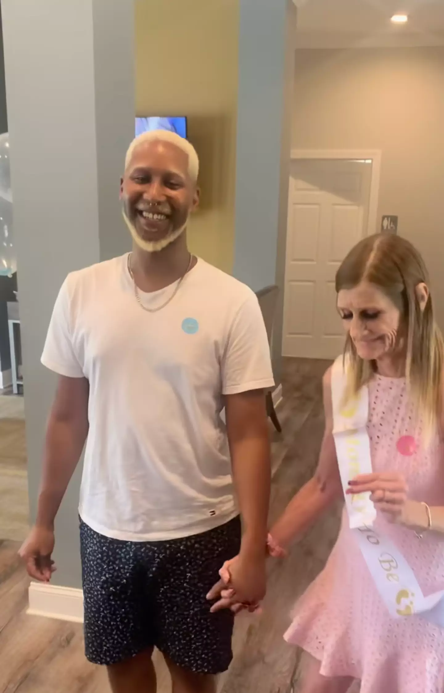 The pair recently revealed the gender of their baby, who they're welcoming via a surrogate. (TikTok/@therealoliver6060)