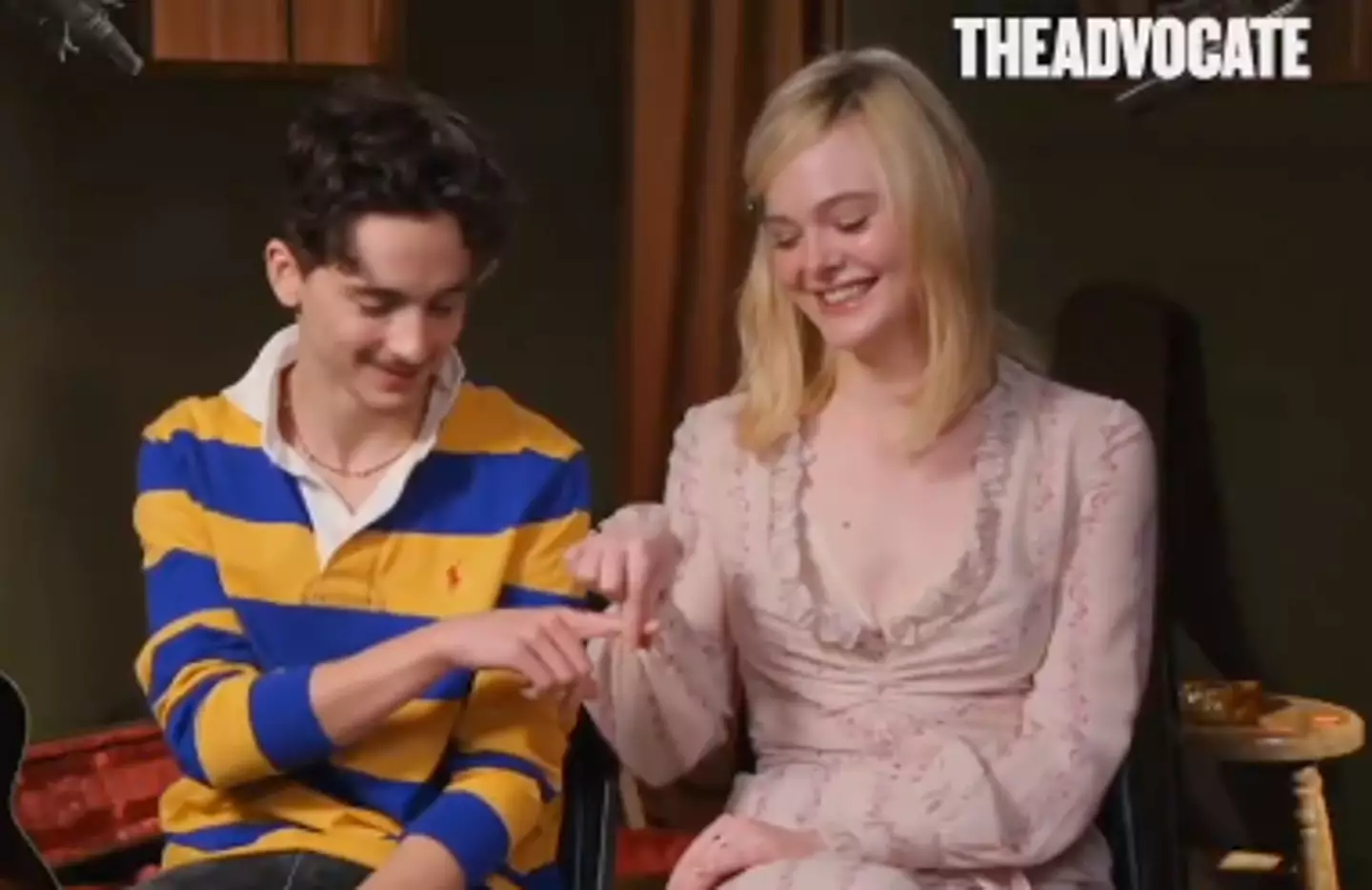 Timothée Chalamet and Elle Fanning sat with the reporter to discuss their roles in a new biopic (Advocate channel)