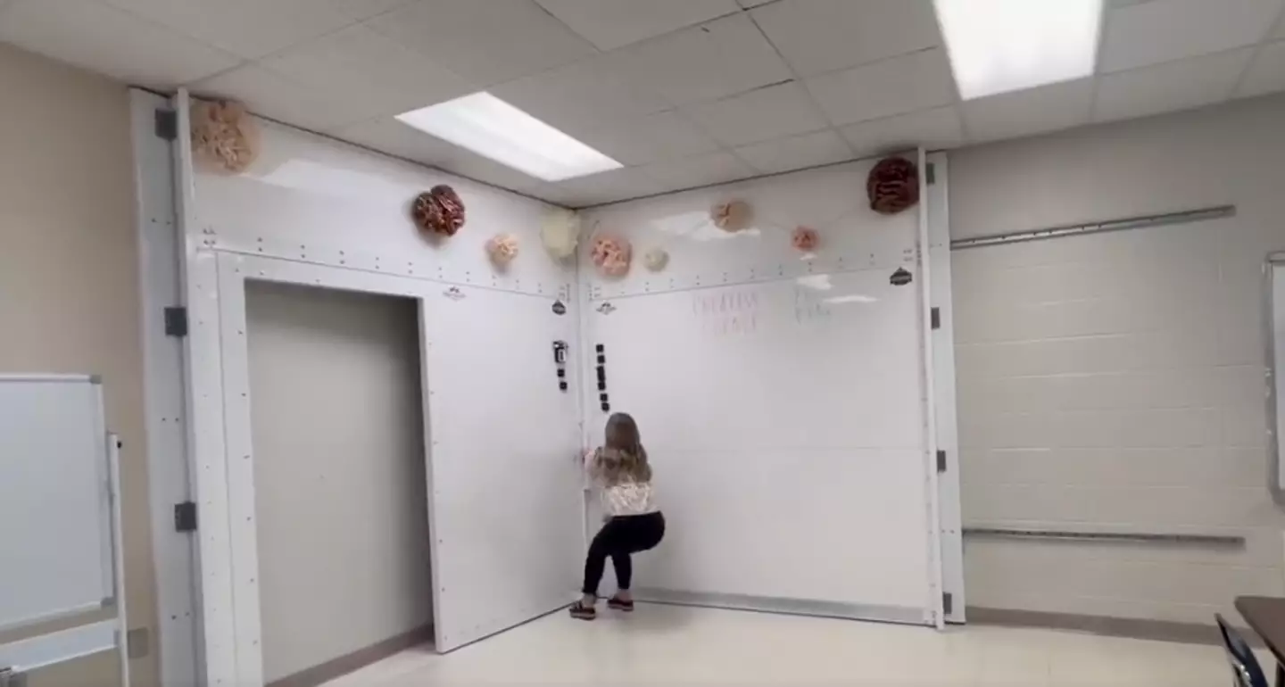 The room extends from a whiteboard.